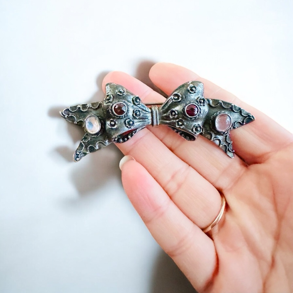 Vintage moonstone garnet silver bow brooch